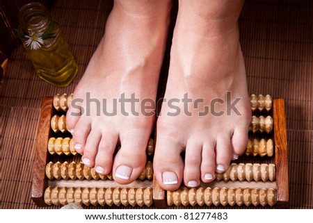 Woman's french manicure and pedicure