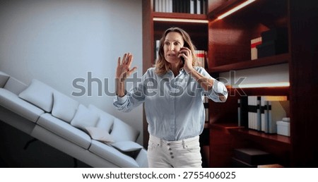 Woman's Funny Mistake While Moving Furniture In Narrow Room. A Confused Woman In Pain Calling Interior Design Center