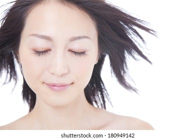 Woman's Hair Blown Away By The Wind