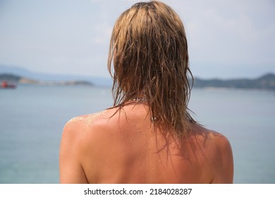 Woman's Hair On The Beach. Wet Hair Close Up Image. Hair Damage Due To Salty Ocean Water And Sun, Summertime Hair Care Concept.	