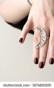 Woman's Hand With A Big Openwork Silver Ring. Handmade Statement Jewelry.