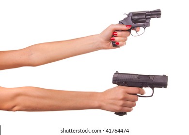 Woman's hand with a gun. Isolated on white.