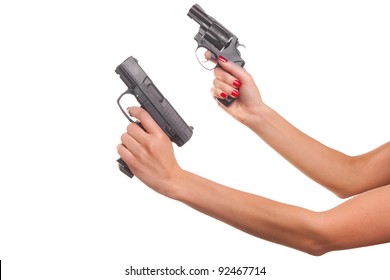 Woman's hand with a gun. Isolated on white.