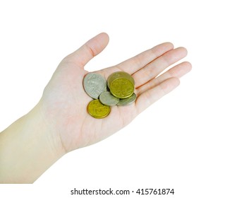 Woman's hand holding Australian coins (with clipping path)