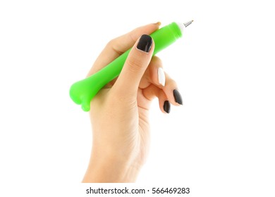 Woman's Hand Holding A Ballpoint Pen
