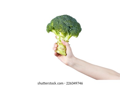 Woman's Hand Holding Brocoli On White Background