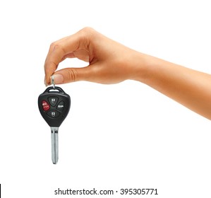 Woman's hand holding car keys isolated on white background. Close up - Shutterstock ID 395305771