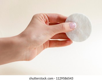 Woman's Hand Holding Clean Cotton Pad. Make-up Removal, Beauty, Spa, Body Care.