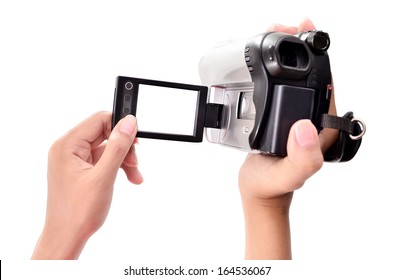 Woman's Hand Holding A Home Video Camera