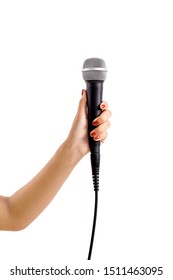 Woman's Hand Holding A Microphone Isolated On White Background