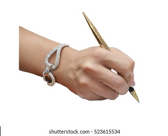 Woman's Hand Holding A Pen Isolated On White Background. Business Concept