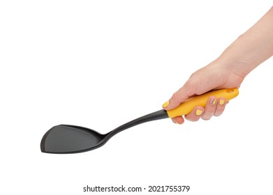 Woman's Hand Holding Plastic Spade For Preparation Food.