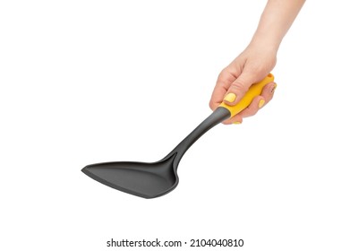 Woman's Hand Holding Plastic Spade For Preparation Food.