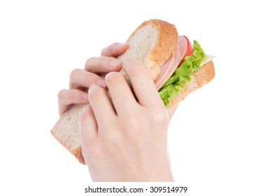 Woman's Hand Holding A Sandwich Isolated On White Background