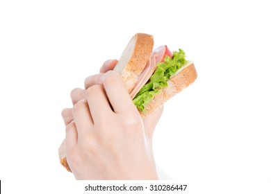 Woman's Hand Holding A Sandwich Isolated On White Background