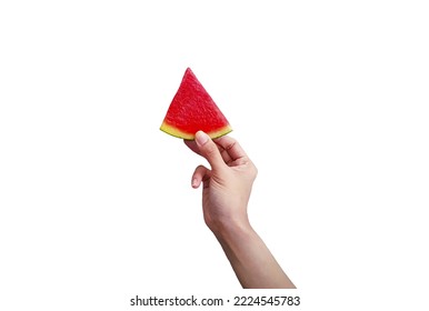 Woman's hand holding sliced piece of fresh watermelon isolated on white background with clipping path and make selection. Freshness fruit for summertime and Healthy eating food. Delicious meal, Funny