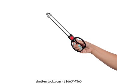 Woman's Hand Holding Stainless Steel Tongs Isolated On White Background. 