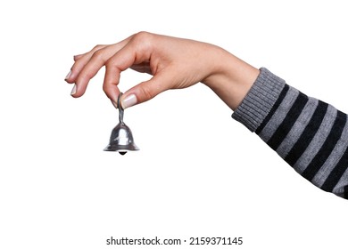 A woman's hand holds a bell on a white background, isolated - Shutterstock ID 2159371145