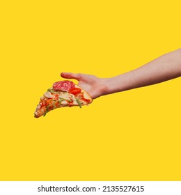 a woman's hand holds a piece of pizza. yellow background - Powered by Shutterstock