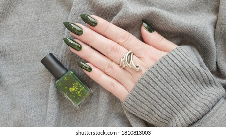 manicure hand and bottles