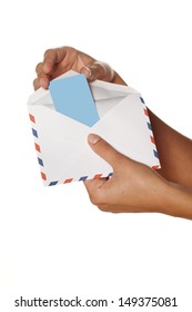 Woman's Hand Pulls A Credit Card From The Envelope