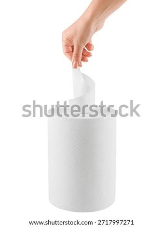 A woman's hand pulls a sheet from a roll of white paper towel. Isolate on a white background. Vertical photo.