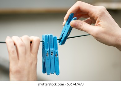 Womans Hand Putting Clothespin On Wire Stock Photo 636747478 | Shutterstock