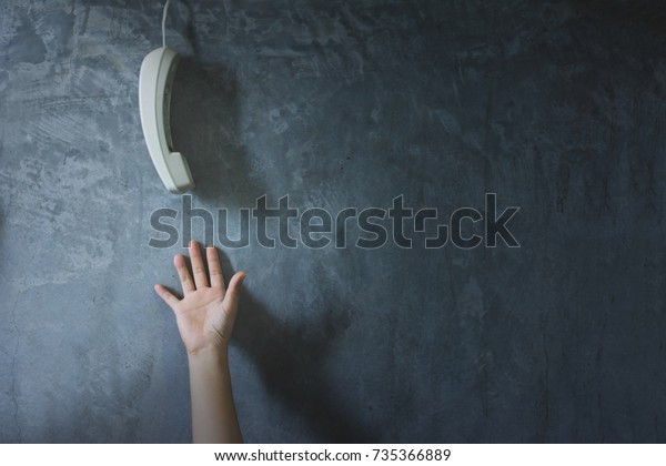 woman\'s\
hand reaching out for call, need help\
concept