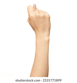 A woman's hand is shown with her fingers curled into a fist, with her thumb pointing upward. The hand is isolated against a white background - Powered by Shutterstock