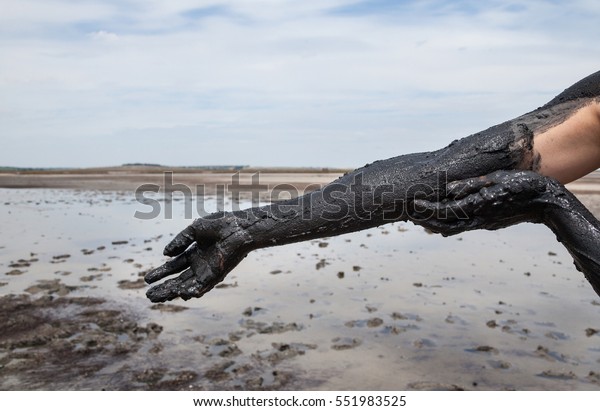 Womans Hand Smearing Black Healing Mud Stock Photo 551983525 | Shutterstock