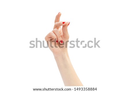 Woman's hand snapping by fingers. Isolated on white.