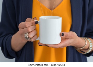 womans hands holding a white mug, perfect for displaying your quote, design on mugs you sell.