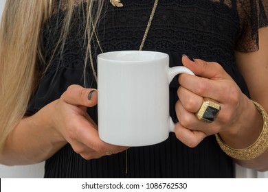 womans hands holding a white mug, perfect for displaying your quote, design on mugs you sell.