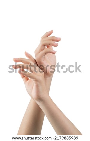 Woman's hands, intertwined in the air with elegant pose, and white background