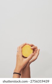 Woman's hands using a bar of solid soap