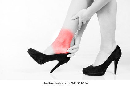 Woman's Legs Ankle Pain In High Heels