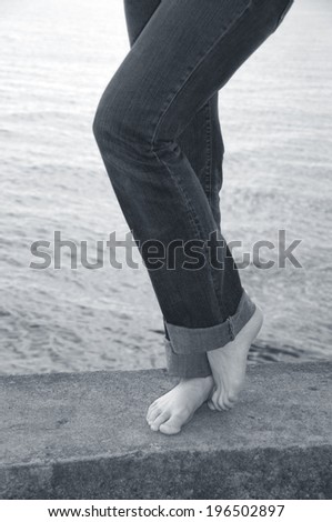 Similar – Feet standing on stone spiral staircase