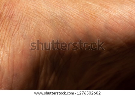 Woman's skin on foot sole, Close up & Macro shot, Asian Body skin part, Healthcare concept, Abstract background
