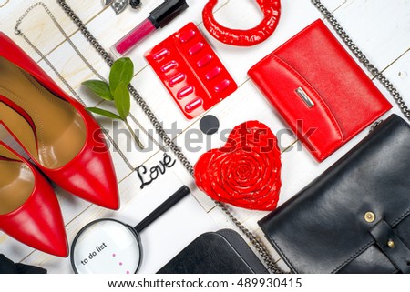 Women accessories and shoes on light background. Top view. Copy space for text.