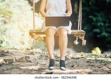 Women Asian Using Laptop Shopping Online In Relaxation Area Forest