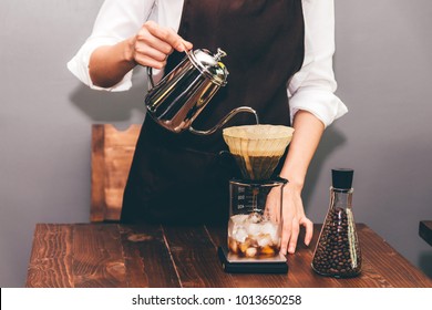 Women Barista Making Drip Coffee In The Cafe