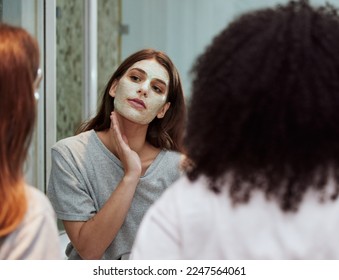 Women, bathroom skincare or face mask bonding in house, home and hotel spa wellness, girls hospitality or healthcare grooming. Friends, people or beauty facial product for wellness cleaning in mirror - Powered by Shutterstock