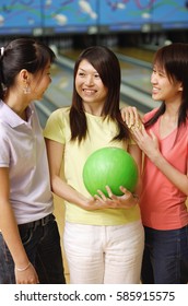 Women At Bowling Alley, Standing Side By Side