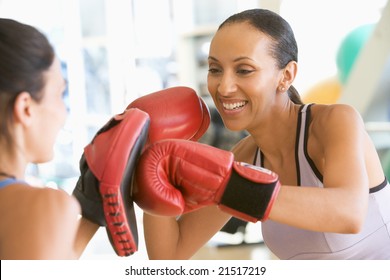 Women Boxing Together At Gym - Powered by Shutterstock