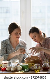 Women Cooking Pizza At Home. 