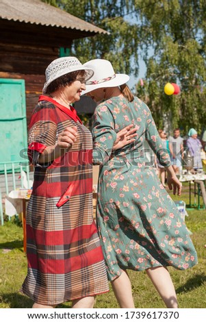 Women dance at Sabantuy national holiday