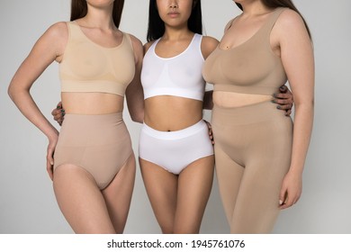 Women of different height, figure type and size dressed in underwear