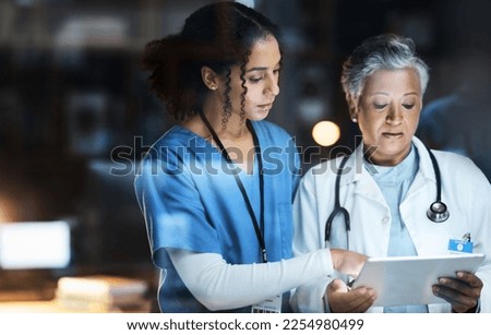 Women, doctors and tablet for night medical research, surgery planning and teamwork in hospital. Nurse, healthcare and worker collaboration on technology in late shift for wellness thinking and ideas