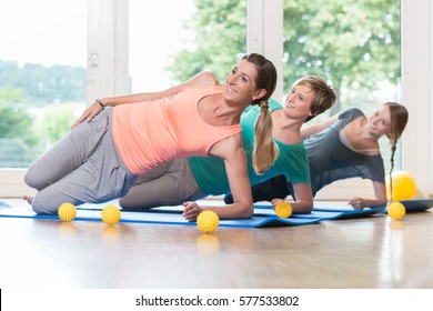 Women Doing Exercises For Pelvis Floor In Postnatal Regression Course