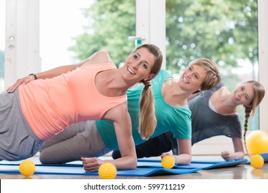 Women Doing Exercises For Pelvis Floor In Postnatal Regression Course